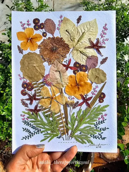 This piece is a bouquet of memories, made from real pressed flowers and leaves I've collected from my travels. It's a unique way to bring the beauty of nature indoors, preserving it forever in a delicate arrangement.