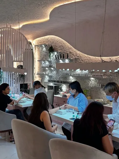 The view from one of our styling stations. The salon's design, with its soft curves and modern touches, is all part of the luxurious experience we offer.