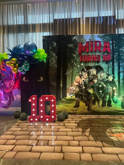 The impressive 'How to Train Your Dragon' decor for Mira's 10th birthday, where we catered a feast fit for little Vikings.