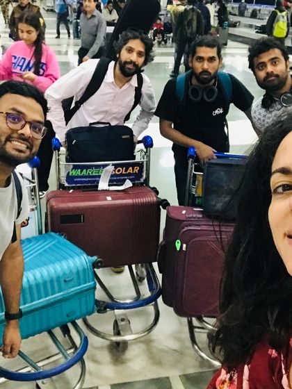 A selfie of our team at the airport, ready to tour. As an international collective, travel is a huge part of our life, allowing us to share our French-Indian productions with the world.