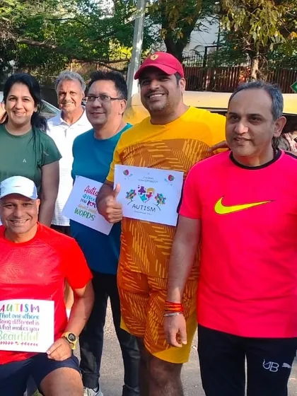 Our group participating in an Autism awareness run. We believe in running for a cause and using our platform to support important initiatives.