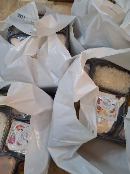 Bags of bulk lunch thali orders, packed and ready for dispatch. I can handle large orders for corporate events and offices.