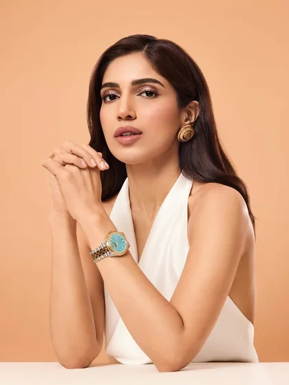 When styling Bhumi Pednekar for Versace watches, the focus was on sophisticated luxury. I paired a simple white halter top with statement vintage Versace earrings to draw attention to the elegant timepiece, creating a clean and classic commercial look.