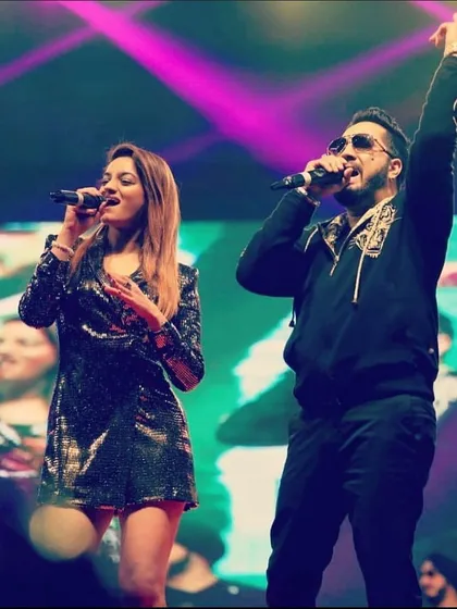 A live performance shot with Mika Singh. I am comfortable performing duets and harmonizing with other artists on stage and in the studio.
