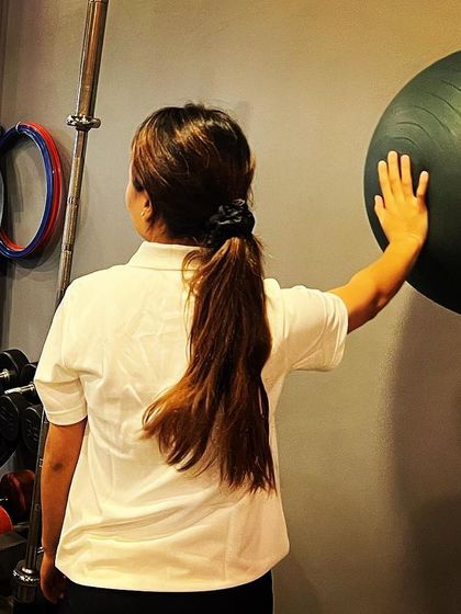 Thutan's focus and expertise shine as she prepares for a client session. We are excited to see her grow professionally with our team.