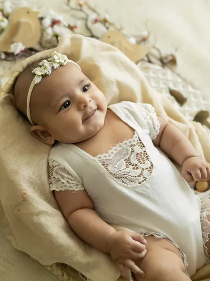 A soft, happy smile. This photo captures a moment of pure contentment and peace.