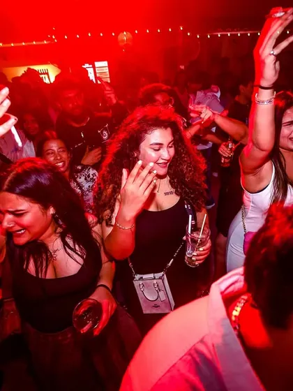 The crowd completely lost in the music at our Block Party. My goal is to create a space where everyone feels free to let loose and just vibe.