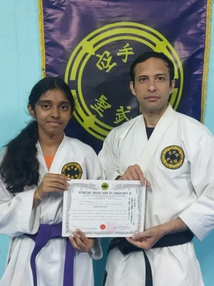 Congratulations to this dedicated student on her promotion to 5th Kyu (purple belt). This rank signifies a deeper commitment to her karate training and skill development.