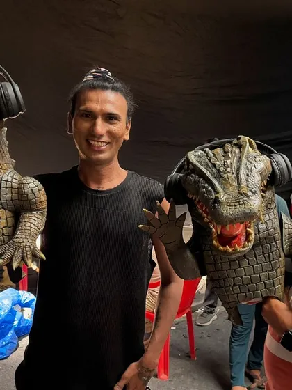 My talented team of puppeteers, Kaustubh and Kailash, posing with the crocodile puppets they helped bring to life. Collaborative effort is key to the success of these large-scale projects.