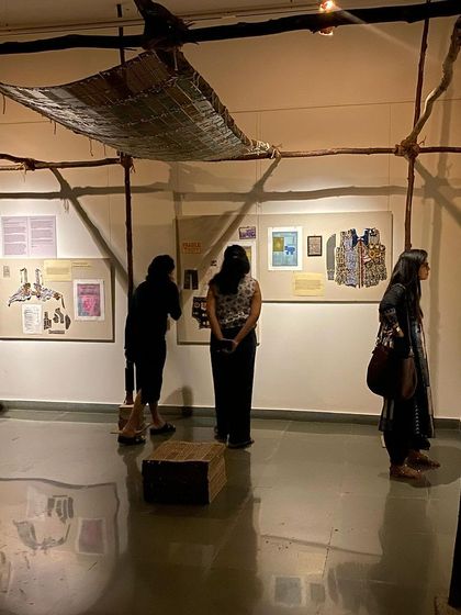 The MAP team exploring the details of Archana Hande's immersive installation.