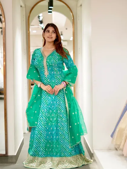 Grace stitched in green. This beautiful bandhani print Anarkali speaks for itself.
