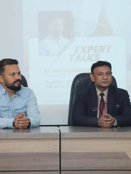 Seated with a senior faculty member during the expert talk session.