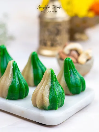 These two-toned modaks are so unique. I used a simple white marble platter to let their interesting colour and shape be the main focus of the photograph.