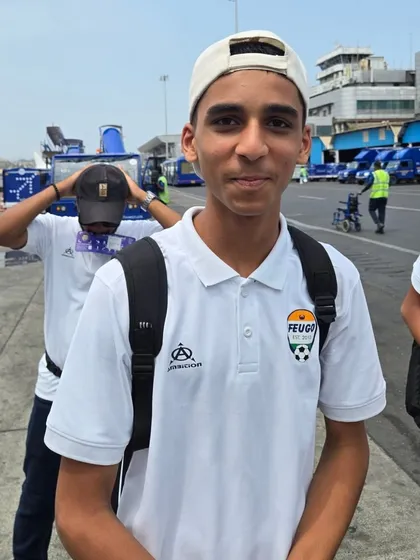 A player smiling on the tarmac, ready to board the flight to Goa.