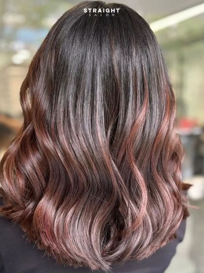 With good-looking hair, I can deal with anything. This look features a beautiful blend of dark hair with subtle reddish-brown highlights.
