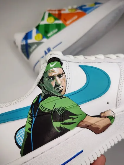 Another angle of the Federer portrait, set against a custom-painted teal swoosh. This pair was made for a huge fan of the tennis legend.