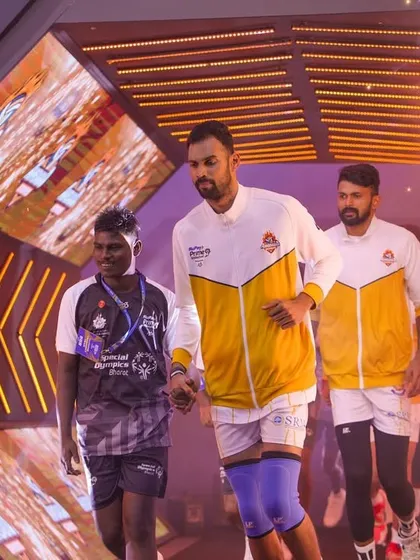 Players make their way to the court through a custom-built entrance tunnel at the Prime Volleyball League. We design these immersive experiences to build anticipation.