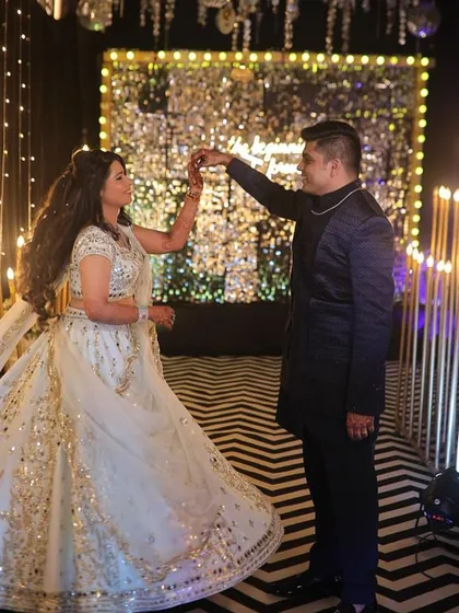 Another shot from the sangeet dance. The makeup is flawless and photo-ready, ensuring every moment is captured beautifully.