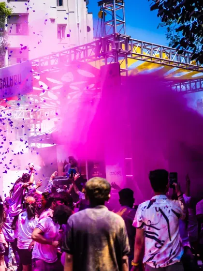 Nothing beats the energy of an open-air Holi festival. Here I am, blasting pink color smoke over a massive crowd in Bengaluru, mixing high-energy beats with the vibrant chaos of the celebration.
