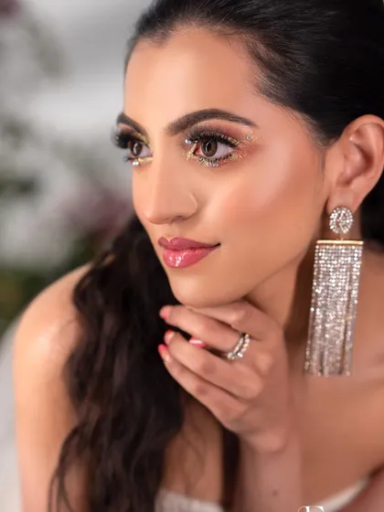 This is the result of a creative photoshoot, showcasing a high-glam party look. The focus is on creating luminous skin, sparkling eyes, and a look that feels both modern and elegant. This is the level of artistry and finish I teach my students to achieve.