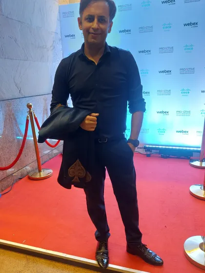 Another shot from the red carpet. My custom jacket with the spade symbol is a signature part of my magician persona.