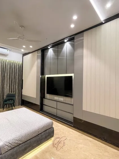 This angle highlights the modern lighting fixtures and the cozy seating nook by the window. It’s a perfect spot to relax and enjoy the view.