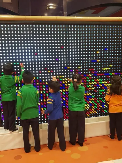 Let creativity shine! Our giant light-up peg wall is where art and play meet. Kids love creating glowing masterpieces together, making it a highlight of any visit, including our popular school picnics.