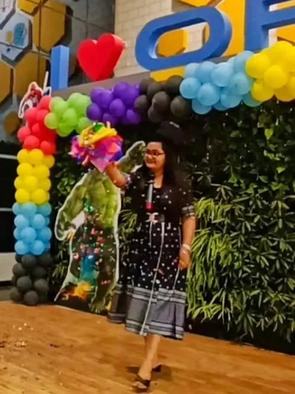 Performing a colorful illusion during a corporate family day at Opus Consulting Services. My shows are always family-friendly and fun for all ages.