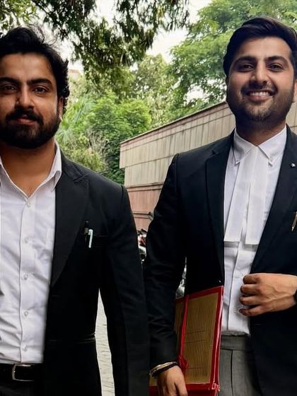 With my brother outside the court. Our family bond translates into a powerful partnership when fighting for our clients' rights.