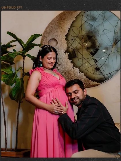 An intimate moment between expecting parents is priceless. We focus on capturing that deep connection, like this quiet moment of Anurag listening to his baby's heartbeat, creating a memory filled with love and anticipation.
