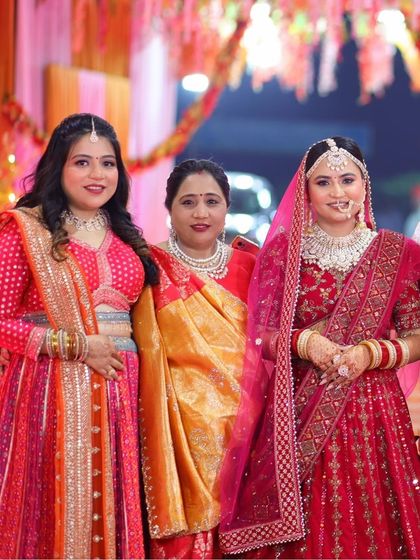 The bride with her family. My services extend to the entire family for a cohesive and beautiful look in all your family portraits.