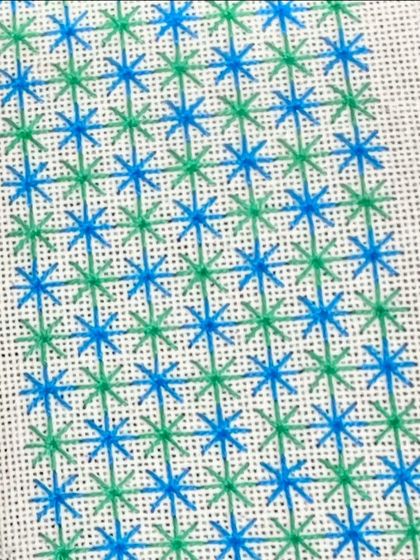 A close-up of a star-like stitch sampler. Learning embroidery is a great way to update your creative skills.