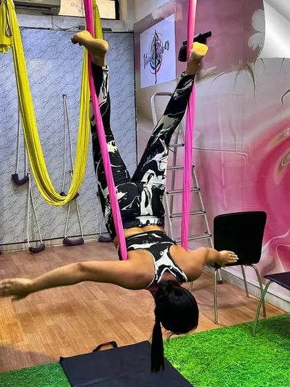 Turn your world upside down to find a new perspective. Inversions like this are a core part of our practice, helping to decompress the spine, improve circulation, and build upper body strength in a safe, supported way.
