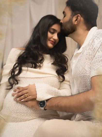 A tender moment between partners. A gentle kiss on the forehead speaks volumes. These are the precious, quiet moments I aim to freeze in time for you.