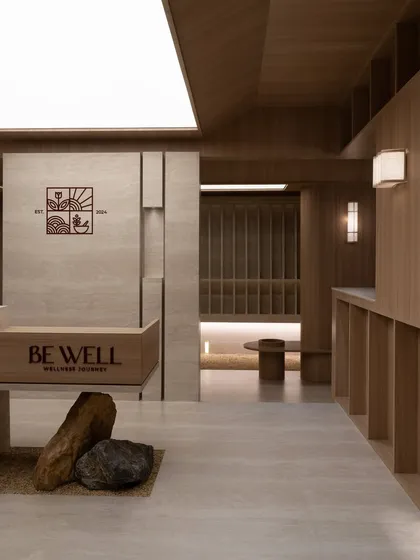 A wider view of the reception, showing the brand's icon and the overall serene atmosphere.