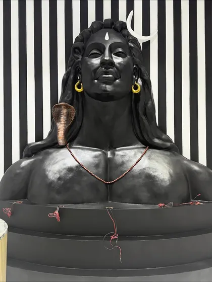Another angle of the installed Shiv mural before the final lighting setup, showing the matte black finish and the intricate details of the Rudraksha necklace.