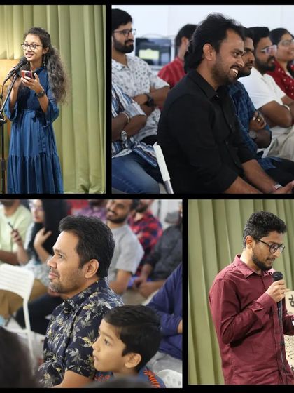 A young performer shares her poetry while the audience listens intently.