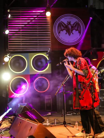 Performing against the iconic Bacardi stage setup at NH7. I have extensive experience working with major brand-sponsored stages and events.