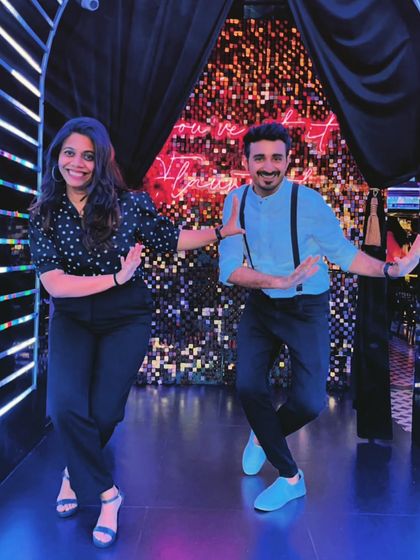 A fun, Bollywood-style pose that shows our playful side. We bring this same energy to our dance sessions to make them enjoyable for everyone.