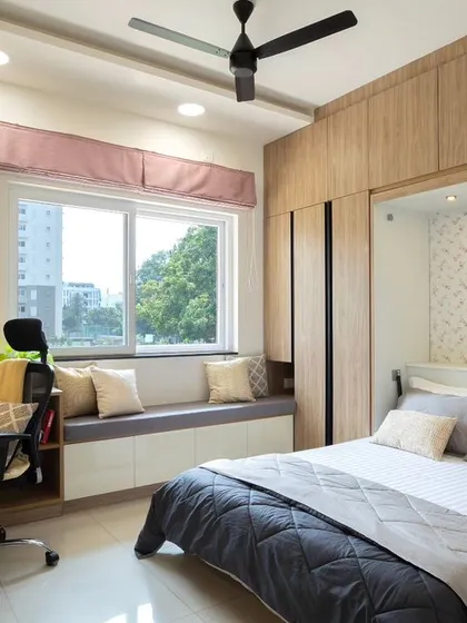This guest bedroom doubles as a home office, a perfect example of my approach to compact home design. The Murphy bed folds away seamlessly, transforming the room and maximizing its functionality for daily use.