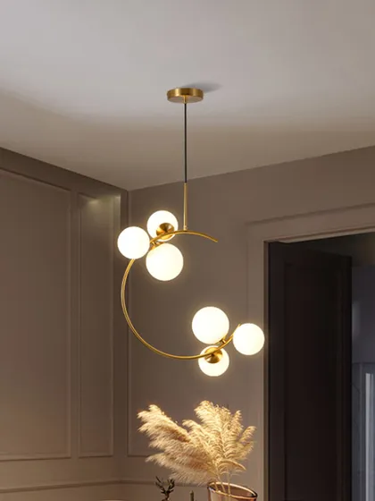 A different view of the curved globe chandelier, showing how it can be hung in various spaces like a living room or entryway. The simple, clean design makes it very versatile.