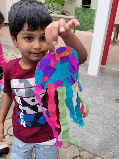 Look at this amazing jellyfish suncatcher! In my "Under the Sea" workshop, every child gets to create a beautiful piece of art to take home. It's so rewarding to see their proud smiles.