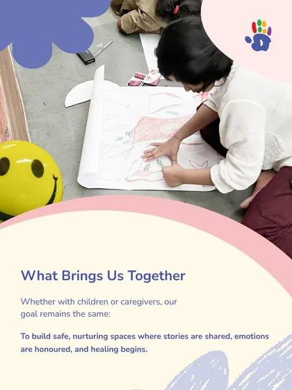 Whether with children or caregivers, our goal remains the same: to build safe, nurturing spaces where stories are shared, emotions are honored, and healing begins. This image captures a moment of creative expression in one of our community workshops.
