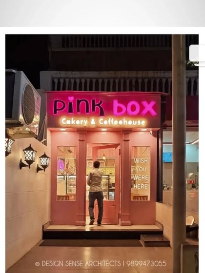 Another view of the inviting facade. The "Wish You Were Here" neon sign in the window adds a personal, whimsical touch that makes people want to step inside.