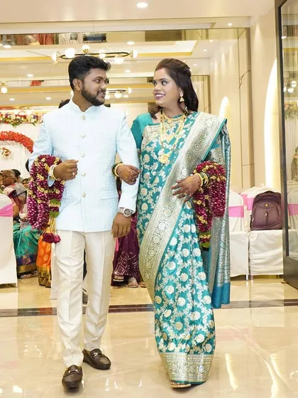 The couple's entrance at their reception. The bride's elegant makeup and hairstyle ensured she looked perfect from every angle.