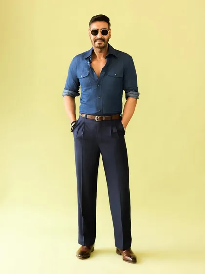 A confident, front-facing shot that perfectly captures the cool and casual vibe of this menswear look.