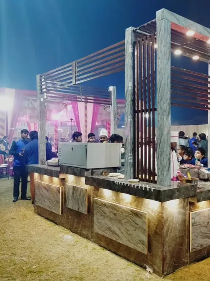 Another perspective of the modern live station, showing its sleek design and how it integrates into the overall event space.