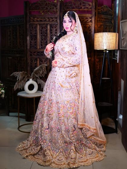 A full-length shot that captures the regal presence of this unique bridal lehenga.