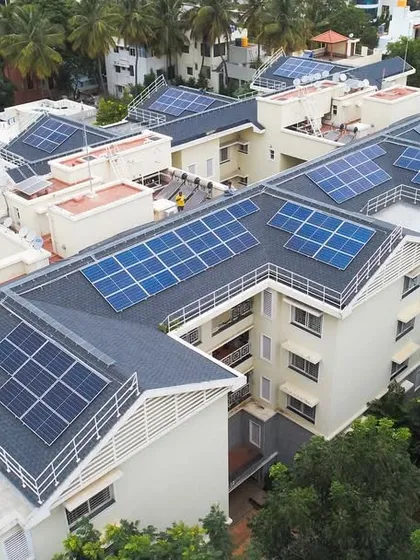 An aerial view of the beautiful Sobha Dew Flower housing society in Bangalore, now powered by our rooftop solar system. We specialize in large-scale community projects that significantly reduce collective electricity costs and carbon footprint.