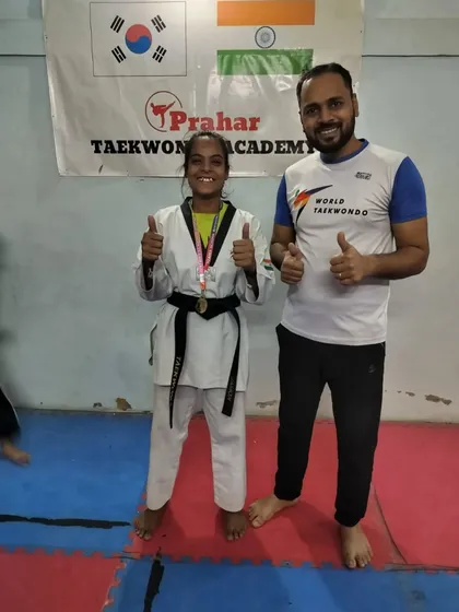 Thumbs up for a great performance from our black belt champion at the Stairs Outer District Championship.
